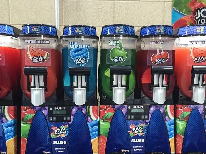 Frozen slush drink machines inside Eagle Smoke & Convenience Shop